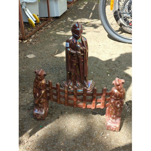 186 - Late 19th/early 20th century cast-iron fireplace companion set—an armoured knight-form tool stand, f... 