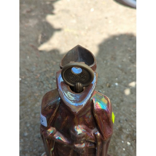 186 - Late 19th/early 20th century cast-iron fireplace companion set—an armoured knight-form tool stand, f... 