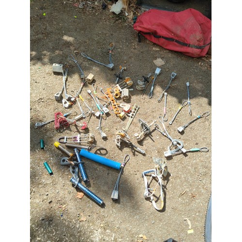 188 - A group of rock-climbing hardware, comprising assorted nuts, hexes, camming devices, slings and cara... 