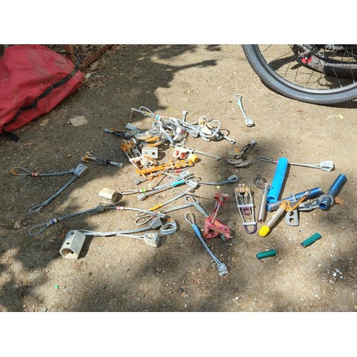 188 - A group of rock-climbing hardware, comprising assorted nuts, hexes, camming devices, slings and cara... 