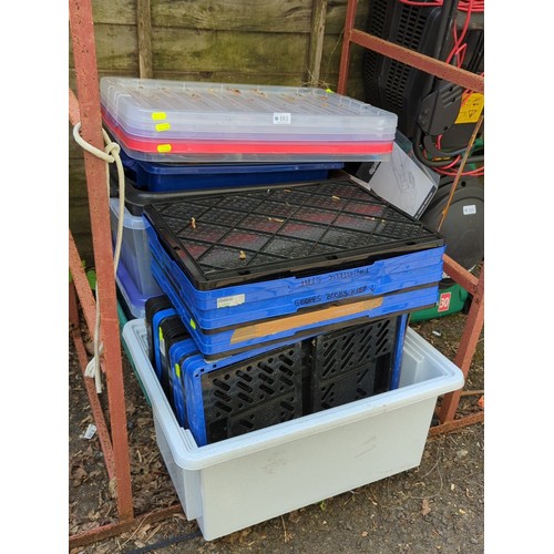 193 - A group of plastic storage containers and lidded crates.