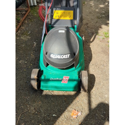 194 - Qualcast ‘Quadtrak 30’ corded electric lawnmower.