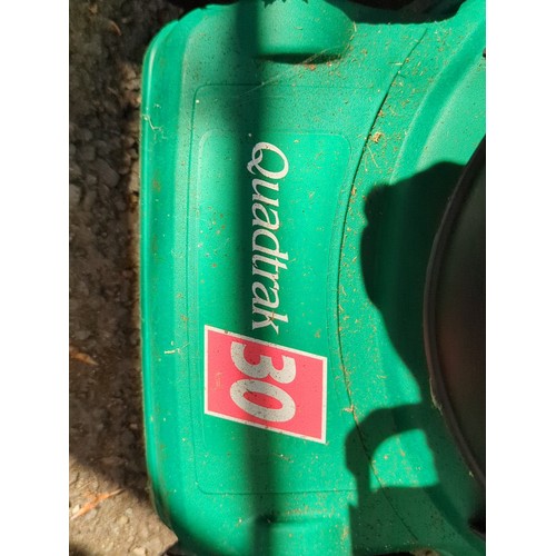 194 - Qualcast ‘Quadtrak 30’ corded electric lawnmower.