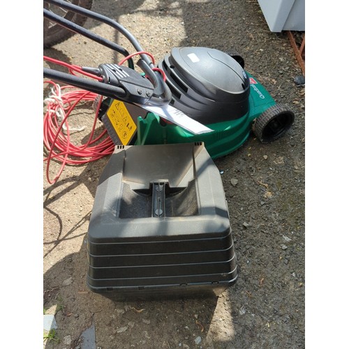 194 - Qualcast ‘Quadtrak 30’ corded electric lawnmower.