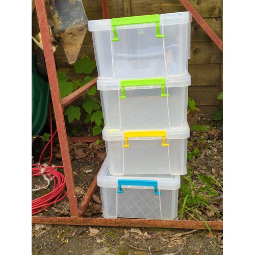 196 - A group of clear plastic lidded storage boxes with clip-fastening handles in assorted colours.
