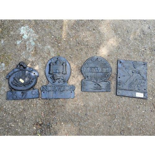 174 - A group of reproduction Norwich decorative plaques.