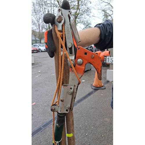 216 - 3 x long-handled garden tools comprising a lopper with orange ratchet mechanism, spring return and c... 