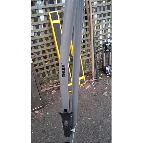 237 - Thule rear-cycle carrier, with twin wheel trays and moulded clamps, incorporating a number-plate mou... 