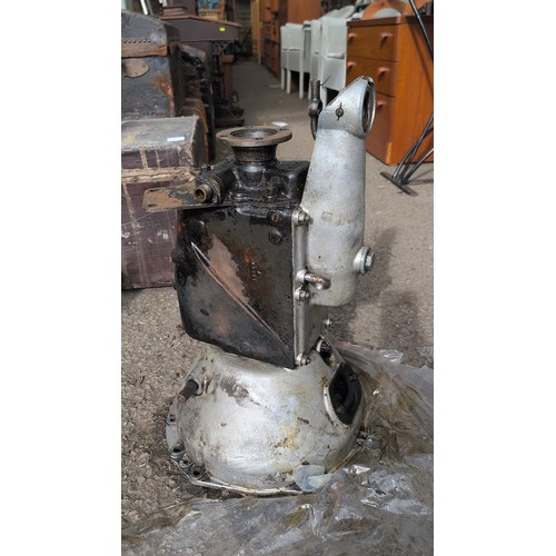 238 - Cast-metal automotive gearbox/transmission housing with integrated bell housing and shift tower.