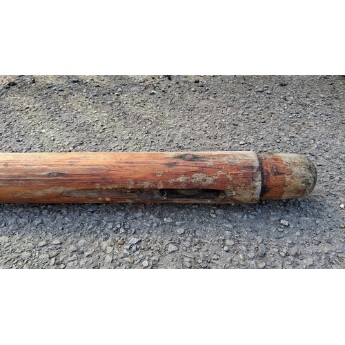 198 - An antique wooden mast.