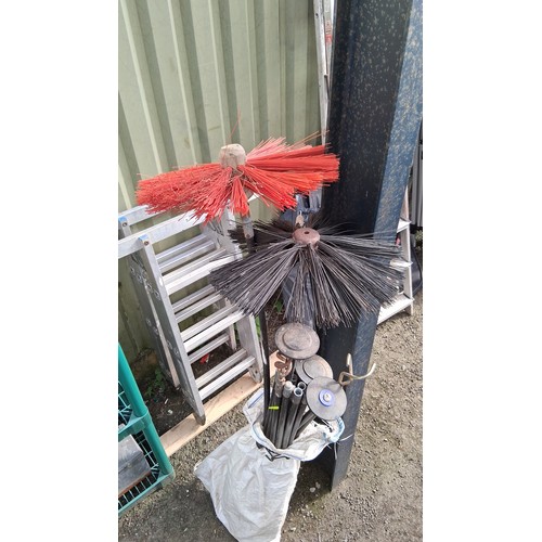 208 - An assortment of chimney-sweep rods and fittings, including nylon brush heads, circular scraper disc... 