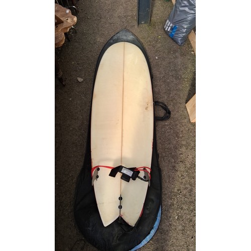 211 - Surfboard with thruster fin set-up and red leash, in a black zippered board bag.