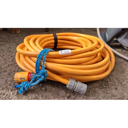 219 - Hozelock freestanding hose reel; together with a separate coil of orange hose.