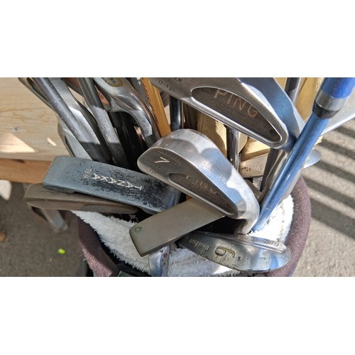 234A - A quantity of golf clubs including metalwoods, irons and wedges, with Dunlop and Ping examples, cont... 