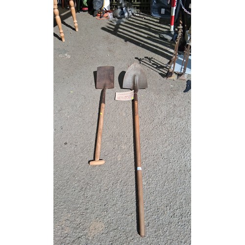 238A - A pair of long-handled garden spades, comprising a Parkes all-steel ‘wheel forward’ pattern with sta... 