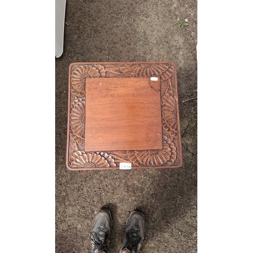 248A - 20th century carved oak occasional table, with bold floral relief border and an undertier carved wit... 