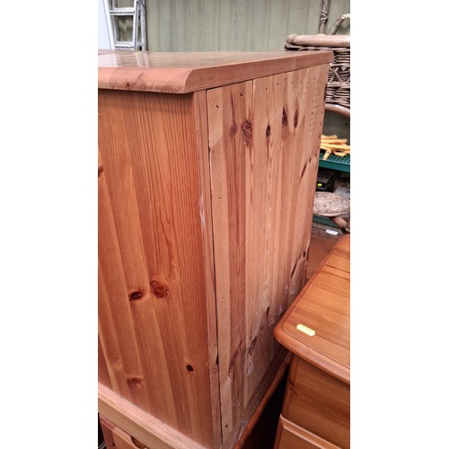 250C - Pair of pine bedsides, late 20th century, each fitted with a single drawer over a cupboard door, on ... 