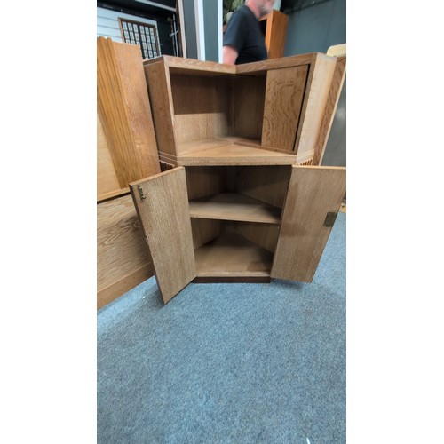 1019 - Pair of limed oak bedside corner units.