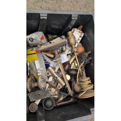 244b - A quantity of mixed door and cabinet hardware, including brass and iron pull handles, escutcheons, r... 
