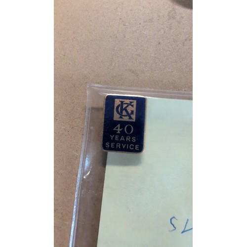 605 - St John Ambulance Association badge, enamel lapel badge ‘40 Years Service’, embroidered St John Ambu... 