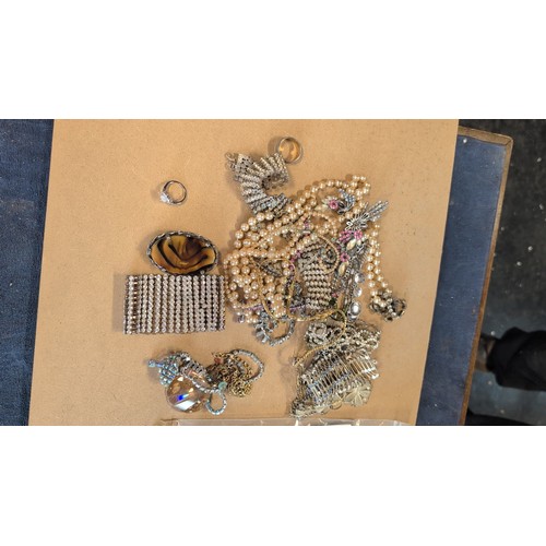 608 - Box of costume jewellery including faux pearls, rhinestone-set bracelets and ring, hair comb, brooch... 