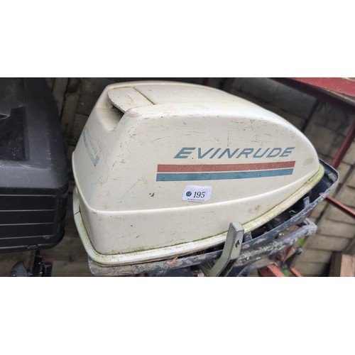 195 - Evinrude outboard motor; with integral clamp bracket and propeller unit.