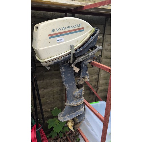 195 - Evinrude outboard motor; with integral clamp bracket and propeller unit.