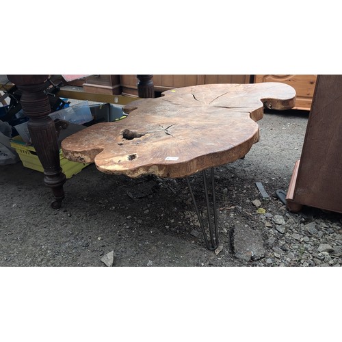 248 - Rustic hardwood occasional table, the free-form slab top displaying natural edge, supported on three... 