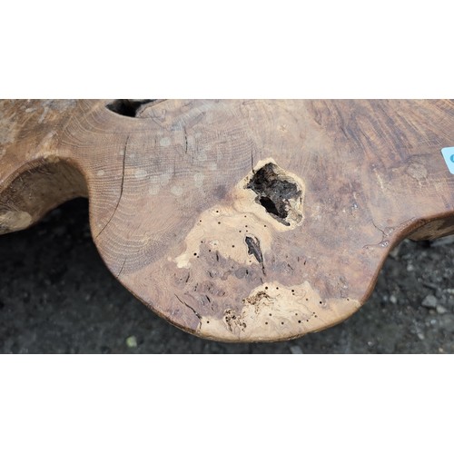 248 - Rustic hardwood occasional table, the free-form slab top displaying natural edge, supported on three... 
