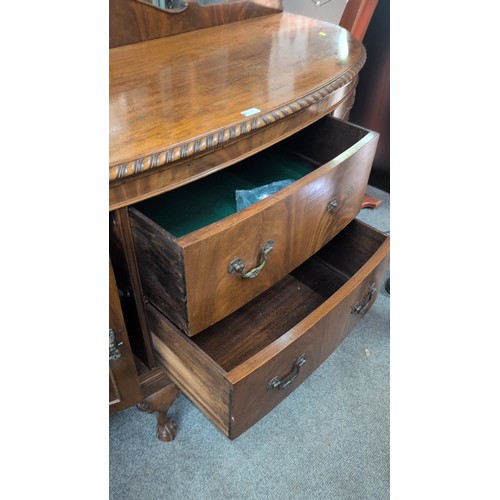 1017 - Bow-front mahogany sideboard, early 20th century, with gadrooned edge and shaped gallery, fitted wit... 