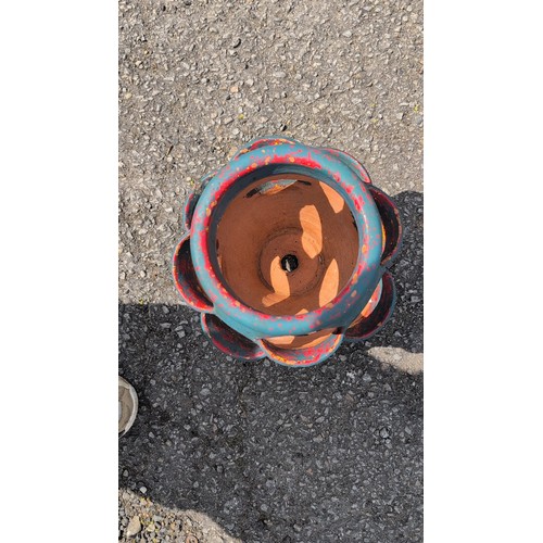 102a - A terracotta strawberry jar, turquoise-painted; the interior left unglazed, with central drainage ho... 