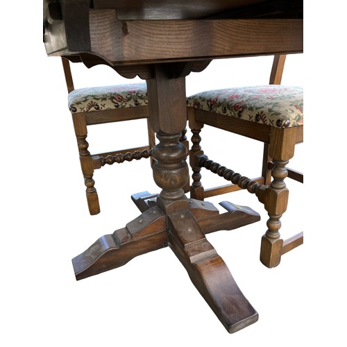1018 - Wood Bros Old Charm round extending dining table & 4 x matching Old Charm Tudor dining chairs