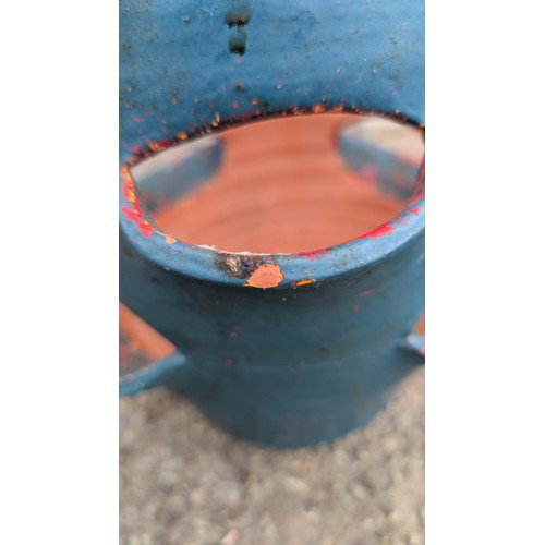 102a - A terracotta strawberry jar, turquoise-painted; the interior left unglazed, with central drainage ho... 