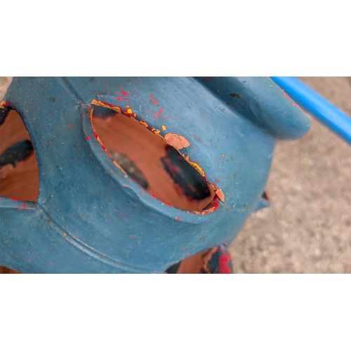 102a - A terracotta strawberry jar, turquoise-painted; the interior left unglazed, with central drainage ho... 