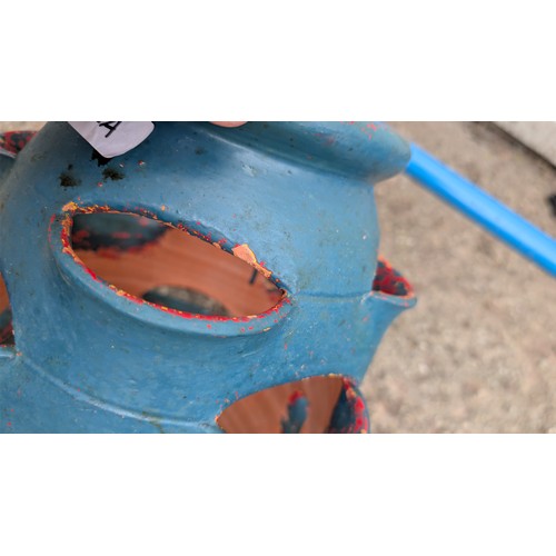 102a - A terracotta strawberry jar, turquoise-painted; the interior left unglazed, with central drainage ho... 