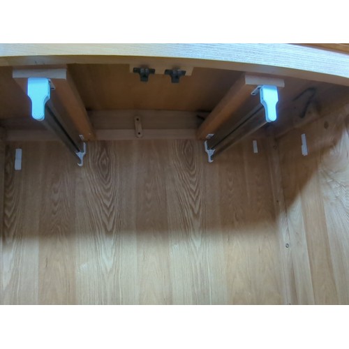212A - Contemporary wardrobe, the arched cornice above two panelled doors with turned wooden knobs and a ro... 
