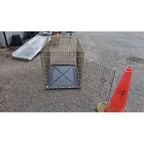 99 - A rectangular wire pet crate with hinged door, carrying handles, and removable black plastic base tr... 