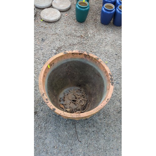 89 - Large terracotta garden planter with moulded foliate and rose garland frieze.