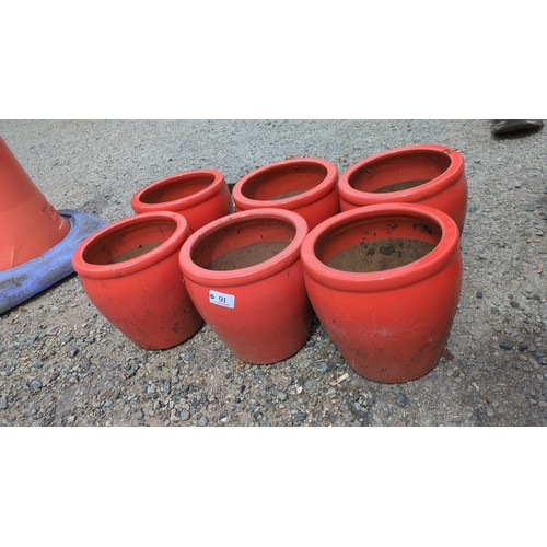 91 - A group of 6 x red glazed ceramic planters.