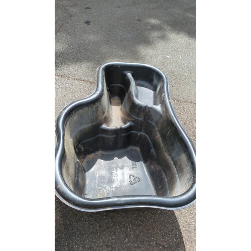 94 - Oase preformed pond set comprising a black plastic pond liner and a lidded tub housing an Oase Filtr... 