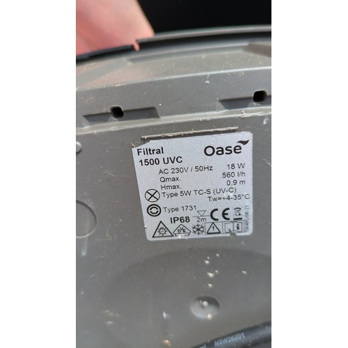 94 - Oase preformed pond set comprising a black plastic pond liner and a lidded tub housing an Oase Filtr... 