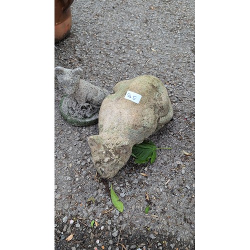 84e - Two cast stone garden ornaments, one modelled as reclining cat