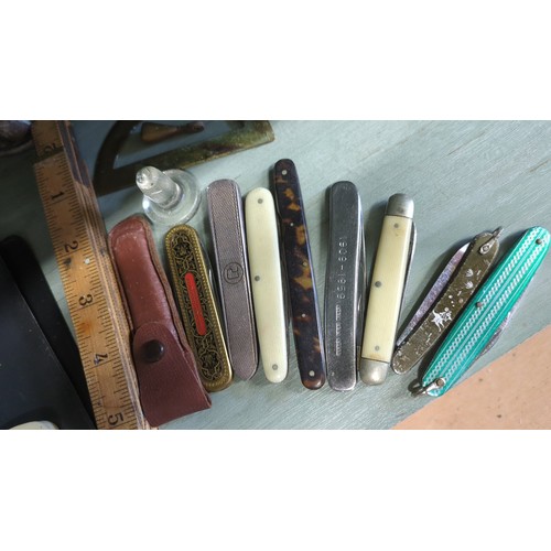 A mixed lot of small curios including a brass beaker with engraved ...