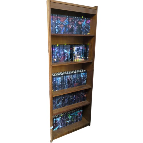 Lot 299: Legends Collection of Warhammer 40k illustrated hardback books, uniformly bound in black boards with numbered spines and continuous wraparound battle scene artwork.