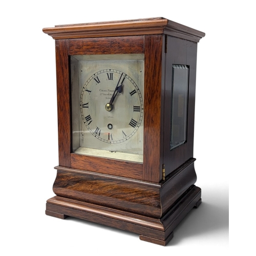Lot 300: Frodsham, London; an early C20 rosewood cased library clock, five glass case, the 3.5" silvered dial with Roman numerals, numbered 2526, eight-day fusee movement, on bracket feet, 25 x 16.5 x 14cm, with key