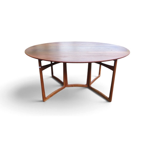 Lot 558: Peter Hvidt and Orla Mølgaard-Nielsen for France & Søn, Danish teak Model 20/59 gateleg dining table, circa 1960; oval top with twin drop leaves on hinged open-frame supports. Manufacturer’s label beneath.
