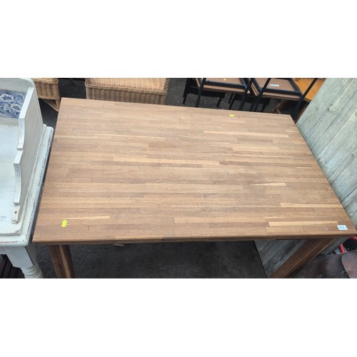 Modern oak refectory-style dining table with rectangular plank top and ...