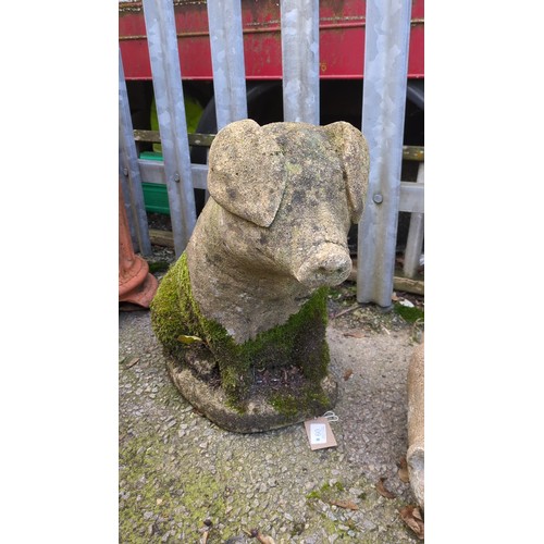 Cast stone garden sculpture modelled as a pig, with pendant ears and a ...