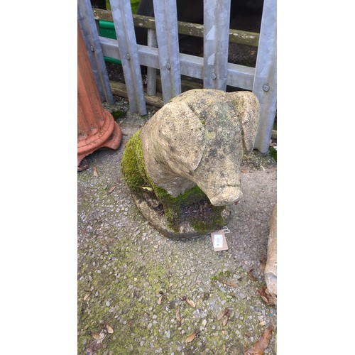 Cast stone garden sculpture modelled as a pig, with pendant ears and a ...