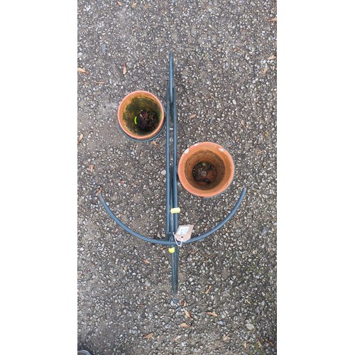 Bicycle-form garden planter in painted tubular metal, with spoked ...